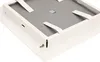 A close-up view of the underside of a white metal ventilation cover or access panel, showing its mounting frame and straps. Náhľad obrázku produktu