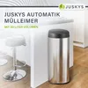 A modern kitchen setting with a JUSKYS automatic trash can and bar stools. Náhľad obrázku produktu