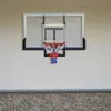 A basketball backboard and hoop mounted on a wall above a stone base. Produktbild-Vorschau