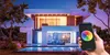 A modern house with colorful LED lighting controlled by a smartphone. Anteprima dell’immagine prodotto