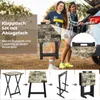 Two women are standing next to a car with a folding table set. Produktbild-Vorschau