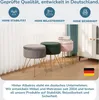 Three upholstered ottomans with gold legs are displayed in a room with a white cabinet and curtains. Produktbild-Vorschau