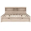 A bed frame with a headboard and storage drawers, shown from the front against a white background. Produktbild-Vorschau