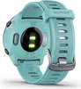 The back of a turquoise Garmin Forerunner 55 smartwatch with its charging contacts and heart rate sensor visible. Podgląd zdjęcia produktu
