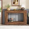 A wooden console table is placed in a hallway, decorated with a plant, a bowl of fruit, and a lamp. Produktbild-Vorschau