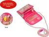 A small pink purse with a floral pattern and a bee charm, shown with a detachable cord. Produktbild-Vorschau