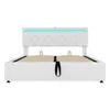 A white upholstered bed frame with a tufted headboard and integrated LED lighting. Náhled obrázku produktu