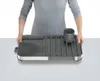 A person holding a dish rack. Voir les images du produit