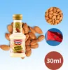 A collage of a bottle of almond extract, almonds, the Moroccan flag, and a size indicator. Voir les images du produit