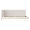A white upholstered bed frame with a tufted headboard and integrated LED lighting. Produktbild-Vorschau