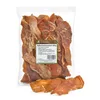 A bag of dried chicken breast fillets for dogs, with some fillets scattered in front of the bag. Produktbild-Vorschau