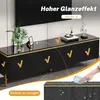 A black TV cabinet with gold accents is shown, with text highlighting its high gloss finish and ease of cleaning. A hand is shown wiping the surface. Anteprima dell’immagine prodotto