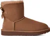 A single brown Ugg boot with a bow on the back, shown from the side against a white background. Anteprima dell’immagine prodotto
