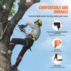 A person climbing a tree using climbing gear. Anteprima dell’immagine prodotto