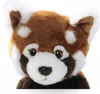 Close-up of a stuffed red panda toy. Voir les images du produit