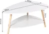A white, two-tiered, oval coffee table with wooden legs, shown with dimensions indicated. Voir les images du produit