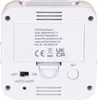 The back of a white digital alarm clock with some text and buttons. Produktbild-Vorschau
