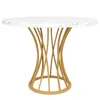 A round dining table with a white marble-like top and a golden, sculptural base, presented against a white background. Produktbild-Vorschau