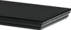 Close-up view of a black shelf with ornate trim. Produktbild-Vorschau