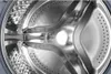 Close-up view of the inside of a washing machine drum. Produktbild-Vorschau