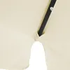 A close-up view of a cream-colored umbrella fabric with a black pole passing through it. Produktbild-Vorschau