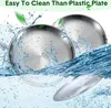 Two metal plates being washed in water with splashes. Produktbild-Vorschau