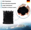A bag of black filter balls and hands holding some of the balls, with a swimmer in the background. Náhľad obrázku produktu
