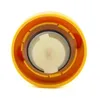 A close-up, top-down view of a yellow cap with a white insert and a black seal. Náhled obrázku produktu
