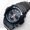 A close-up shot of a black Casio G-Shock watch with a gray dial and blue accents. Produktbild-Vorschau