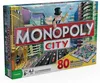 The image shows the Monopoly City board game box, with a cityscape and the Monopoly mascot. Produktbild-Vorschau