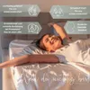 A woman is lying on a bed, stretching and smiling. There are several hexagonal overlays with text and icons around her. Produktbild-Vorschau