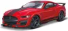 A red Ford Shelby GT500 model car with black racing stripes. Produktbild-Vorschau