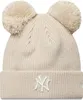 A beige knitted winter hat with two pom-poms on top and the New York Yankees logo on the front. Produktbild-Vorschau