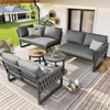 An outdoor patio with a grey modular sofa set and coffee tables. Produktbild-Vorschau