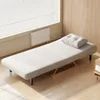 A daybed or sofa bed is shown in a room with wooden walls and a window with blinds. Náhľad obrázku produktu