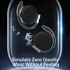 The image shows two black earbuds with clear ear hooks, floating in a dark, starry background with illustrations of astronauts. The earbuds are inside a clear, oval-shaped case. Náhled obrázku produktu