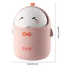 A pink cartoon duck-shaped trash can with a lid and a bow tie. Produktbild-Vorschau