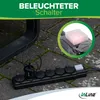 An outdoor power strip with multiple outlets and a switch is shown on a paved surface, with a close-up inset of the illuminated switch. Produktbild-Vorschau