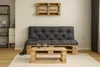 A living room scene with a pallet sofa and coffee table. Produktbild-Vorschau