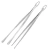 Two stainless steel kitchen tongs are displayed diagonally against a white background. Produktbild-Vorschau