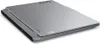 A closed silver laptop is shown from a slightly elevated side angle on a white background. Produktbild-Vorschau