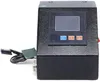 A black electronic device with a screen and buttons, connected to a power cord. Podgląd zdjęcia produktu