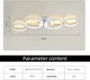 A diagram showing the dimensions of a modern LED ceiling light with multiple rings, accompanied by a table of product specifications. Produktbild-Vorschau