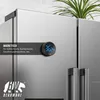 A digital kitchen timer is attached to the side of a stainless steel refrigerator. Voir les images du produit