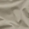 A close-up view of beige fabric with visible texture and folds. Produktbild-Vorschau