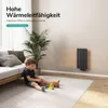 A child is playing with toys on a rug in a living room, with a radiator mounted on the wall. Produktbild-Vorschau