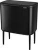 A black Brabantia Bo Touch Bin trash can with four legs, shown from a front-diagonal angle against a white background. Produktbild-Vorschau