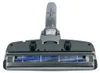 A close-up front view of a vacuum cleaner floor head with a rotating brush. Anteprima dell’immagine prodotto