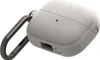 A light gray protective case for wireless earbuds with a dark gray carabiner clip attached. Produktbild-Vorschau