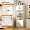 A white kitchen cabinet with multiple shelves and doors, featuring a microwave, toaster, and other kitchen items. The image also includes close-up insets highlighting construction features like anti-toppling kits and a thickened base. Produktbild-Vorschau